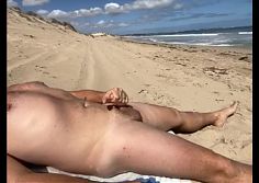 Wanking on the beach